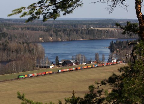 Train by a lake